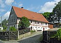 Wohnstallhaus und Scheune eines Zweiseithofes