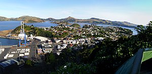 Observation Point is clearly visible behind the container crane, centre left in this panorama of Port Chalmers.