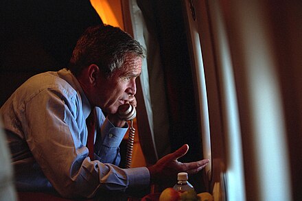 President Bush speaks with Vice President Dick Cheney aboard Air Force One, September 11, 2001