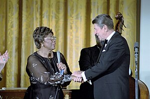 Singer Ella Fitzgerald with Ronald Reagan after her performance at the White House, October 1981 President Ronald Reagan and Ella Fitzgerald.jpg