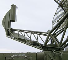 In this military radar, microwave radiation is transmitted between the source and the reflector by a waveguide. The figure suggests that microwaves leave the box in a circularly symmetric mode (allowing the antenna to rotate), then they are converted to a linear mode, and pass through a flexible stage. Their polarisation is then rotated in a twisted stage and finally they irradiate the parabolic antenna. Radar waveguide.JPG