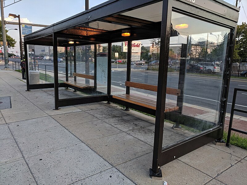 File:Ride On 48 bus stop at Wheaton station.jpg