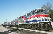 Amtrak 506 in the original "Pepsi Can" livery with the San Diegan in 1992 San Diegan at Simi Valley station, January 24, 1992.jpg