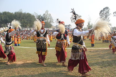 Khasi folk dancers wearing "Jaiñboh" dhotis  and other traditional garb.