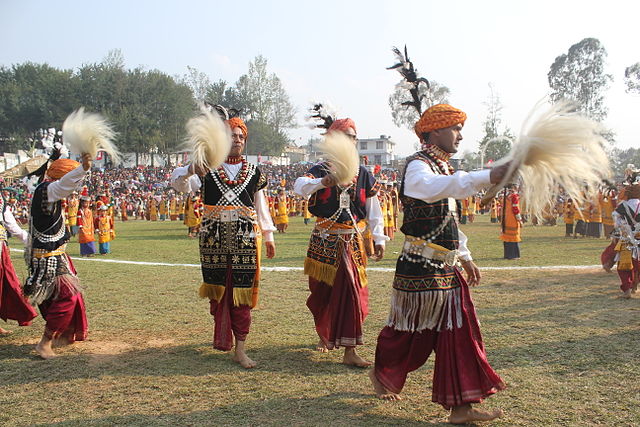 Khasi folk dancers wearing "Jaiñboh" dhotis and other traditional garb.