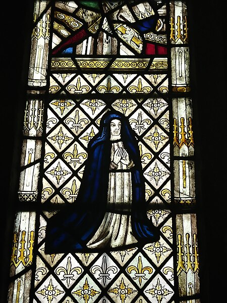 File:Stained Glass kneeling abbess at Llanllugan church.jpg