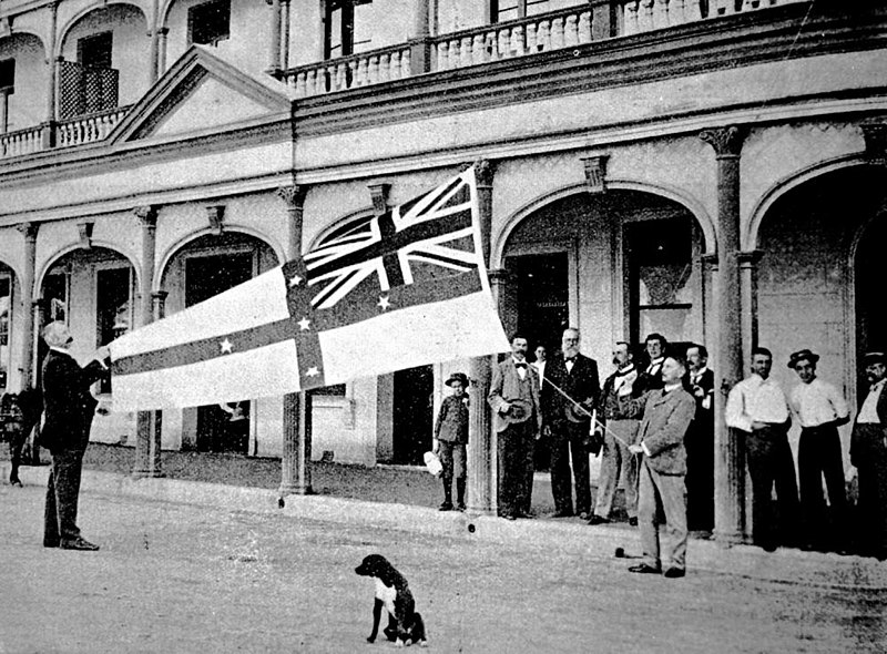 File:StateLibQld 1 118660 Doctor Ahearne hoisting the federal flag at Townsville, 1899.jpg