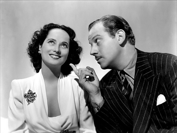 Merle Oberon and Melvyn Douglas in That Uncertain Feeling