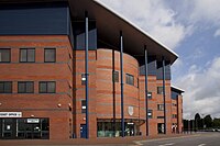 The East Stand, including the club's main reception and ticket office. The Hawthorns exterior.jpg