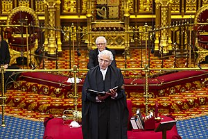 Fowler speaking from the Woolsack in 2021. His deputy and successor, Lord McFall of Alcluith, sits on the steps of the throne behind him. The Lord Speaker, Lord Fowler (51111276104).jpg