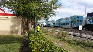 View of the train and garbage truck it struck in Lake Worth