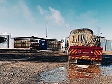 Trucks at Limestone factory, Kiomoni Ward Trucks at Limestone factory, Kiomoni Ward.jpg