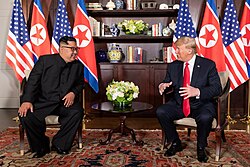 Trump and Kim in the summit room during the DPRK-USA Singapore Summit Kim and Trump in the summit room during the DPRK-USA Singapore Summit.png