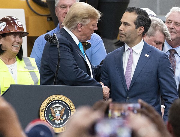 Bush welcomes President Donald Trump to an International Union of Operating Engineers training center in Crosby, Texas, on April 10, 2019