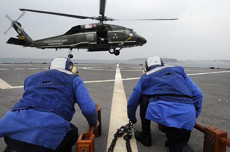 File:US Navy 100201-N-7280V-444 Flight deck crew Sailors prepare to place chocks and chains on an SH-60F Sea Hawk helicopter during flight quarters aboard the U.S. 7th Fleet command ship USS Blue Ridge (LCC 19).jpg