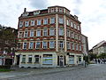 Apartment house in the type of closed development, corner house