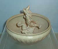 Longquan celadon bowl with a dragon