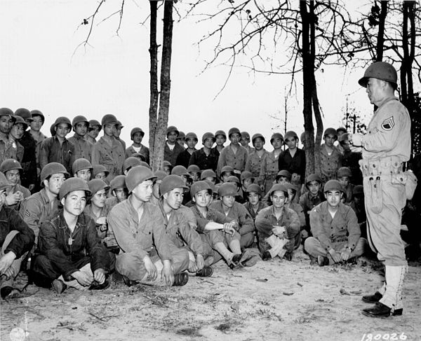 100th Infantry soldiers receiving training in the use of grenades in 1943