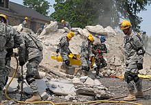 16th Engineer Brigade soldiers clearing a demolished building. 16 ENG BDE.jpg