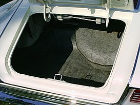 A multi-hinged door is an over-constrained mechanism. 1967 AMC Marlin white with red interior 08.jpg