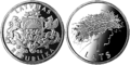 Den første mønt præget i 2006 af Rahapaja Oy i Finland viser: En mand med en Ligokrans på hovedet. Designet af Dace Lielā (grafisk), Ligita Franckeviča(plastformen)