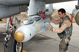 A pilot inspects an AGM-65 Maverick missile on his A-10 Thunderbolt II. AGM-65 Maverick2.jpg