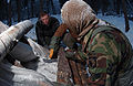 Arctic survival - constructing shelter · 061214-F-4127S-055.JPG