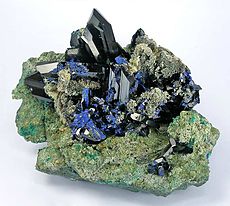 Very large cluster of azurite crystals, ex-Smithsonian collection, offered at US$125,000. Size 16.7 x 13.2 x 10.5 cm.