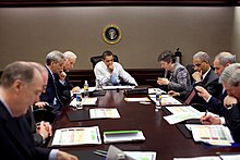 President Obama is briefed in the Situation Room about the H1N1 outbreak. Barack Obama being briefed on swine flu oubreak 4-29.jpg