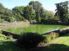 A cooling pond and leat were built behind the main buildings in 1884. British Engineerium (former Cooling Pond and Leat), The Droveway, Hove (IoE Code 365679).JPG