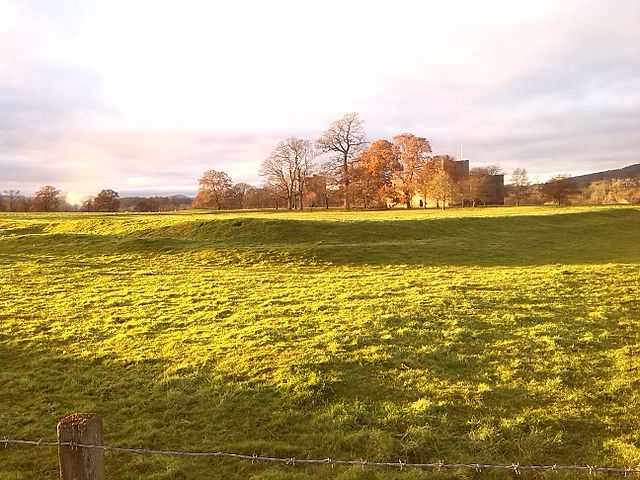 Banks of Brocavum Roman fort in foreground, Brougham Castle behind, and 18th-century Carleton Hall to the left