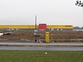DHL and BusStop Mönchhofallee.JPG