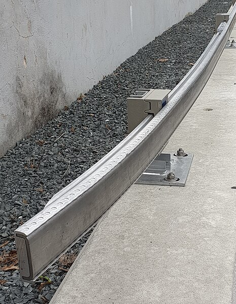 File:Embossed third rail side contact ramp.jpg