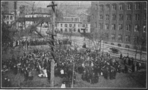 Free speech meeting held by socialists at Clinton Park, with the Phoenix Mill on the right Free speech meeting at Clinton Park during the 1912-1913 Little Falls textile strike.png
