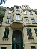 Apartment building in closed development with front garden