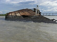 Part of the wreck, showing (centre right) a white-painted frame supporting a navigation light to help vessels to steer clear of it Goslar VI.JPG