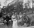 Group of men and women sitting outdoors, May 30, 1898 (WASTATE 2519).jpeg