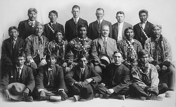 Judge Wickersham (center) in council with Indian chiefs, Fairbanks, Alaska