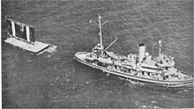 USS Kewaydin (ATO-24) towing a target sled Kewaydin (ATO-24).jpg