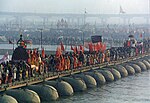 Procession of Akharas marching over the Ganges. Kumbh Mela2001.JPG