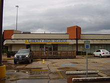 Former campus on U.S. Route 59 (Southwest Freeway) LibertyHighSchoolHoustonTX.JPG