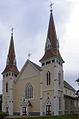 Une photographie en couleurs de la façade de l'église Saint-Jean-Baptiste-de-Miscouche.