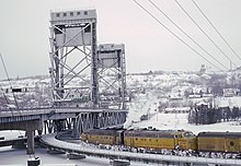 The Copper Country Limited crossing the Portage Lake Lift Bridge in 1967 More Copper Country Limited Photos (27482497891).jpg