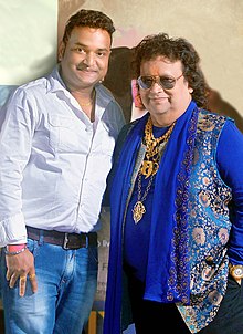 Sarkar mit Bappi Lahiri bei der Premiere von Umformung: The Transformation