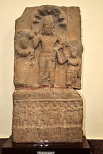 135 CE Image of a Nāga between two Nāgīs, inscribed in "the year 8 of Emperor Kanishka". 135 CE.[70][71][72]
