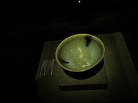 Blue bowl decorated with purple speckles