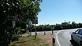 English: The top of Pixley Hill, Norton Green, Isle of Wight, at its junction with Halletts Shute. This photo was taken from Halletts Shute, Pixley Hill drops down to the left.