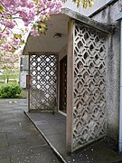 Pierced concrete block screen to the porch