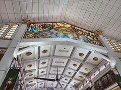 The interiors of the church's nave leading to the main door. The section with wooden gables was added during the expansion of the nave.