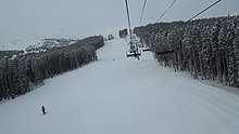 The Independence SuperChair services moderate intermediate terrain on the lower part of Peak 7 Pioneer on Peak 7.JPG